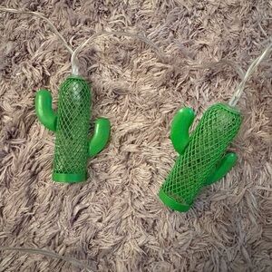 2 Different Sets of Green Cactus String Lights. Both take 2 double A batteries
